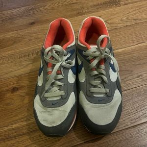 Pink, navy, and grey Nike Air Maxs